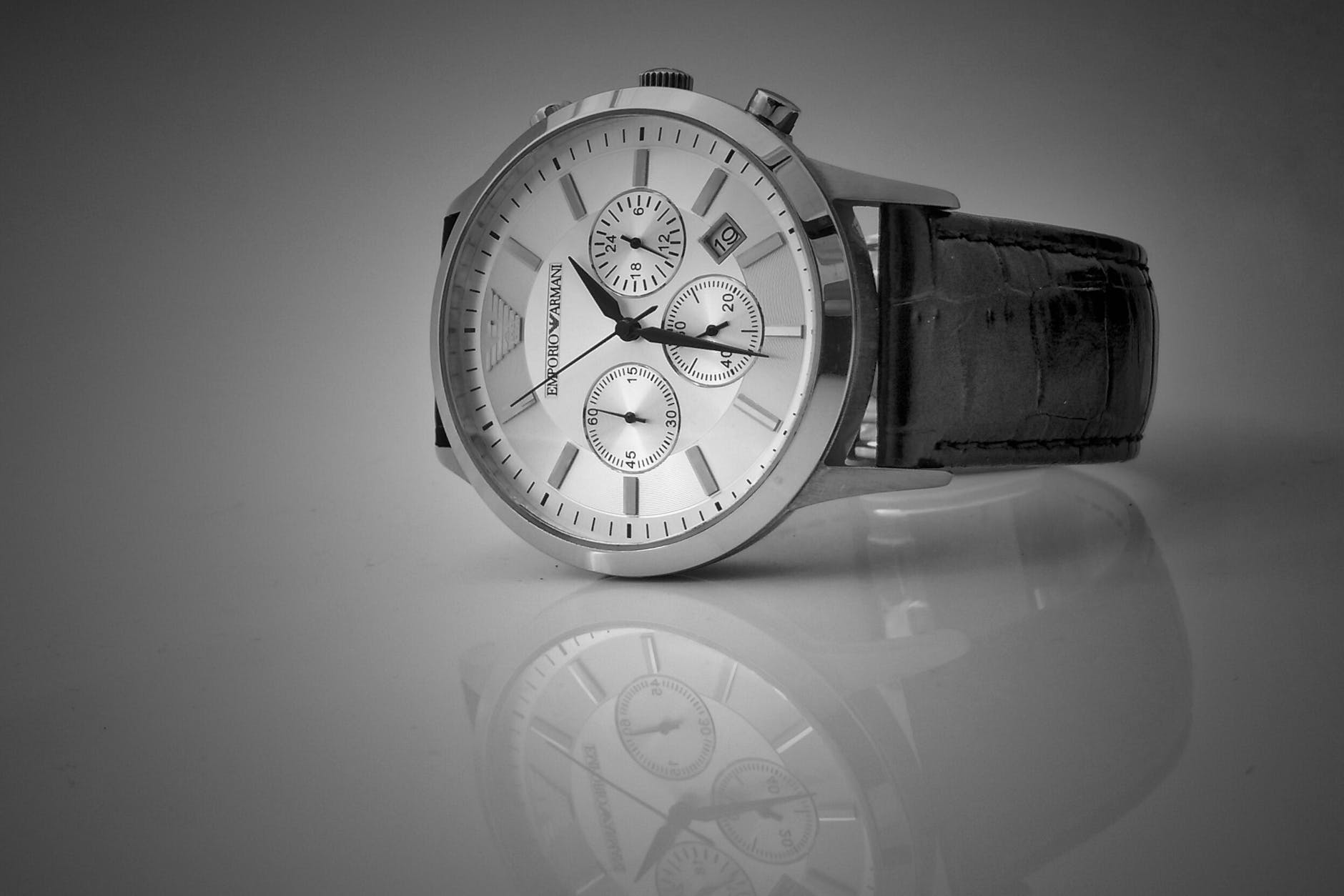 black leather strap silver chronograph watch